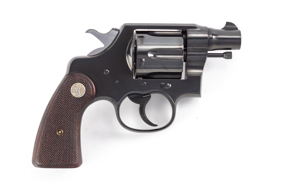 Colt New Service model, .45 Colt caliber, Serial Number 33828, manufactured in 1934, 2" barrel.  Cus