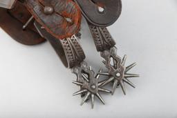 Vintage pair of August Buermann Spurs in the famous Ranger pattern, complete with heel chains and or
