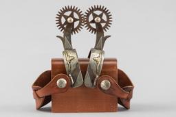 Pair of Jack Ferguson double mounted Spurs with hand engraved silver overlay and raised gold longhor