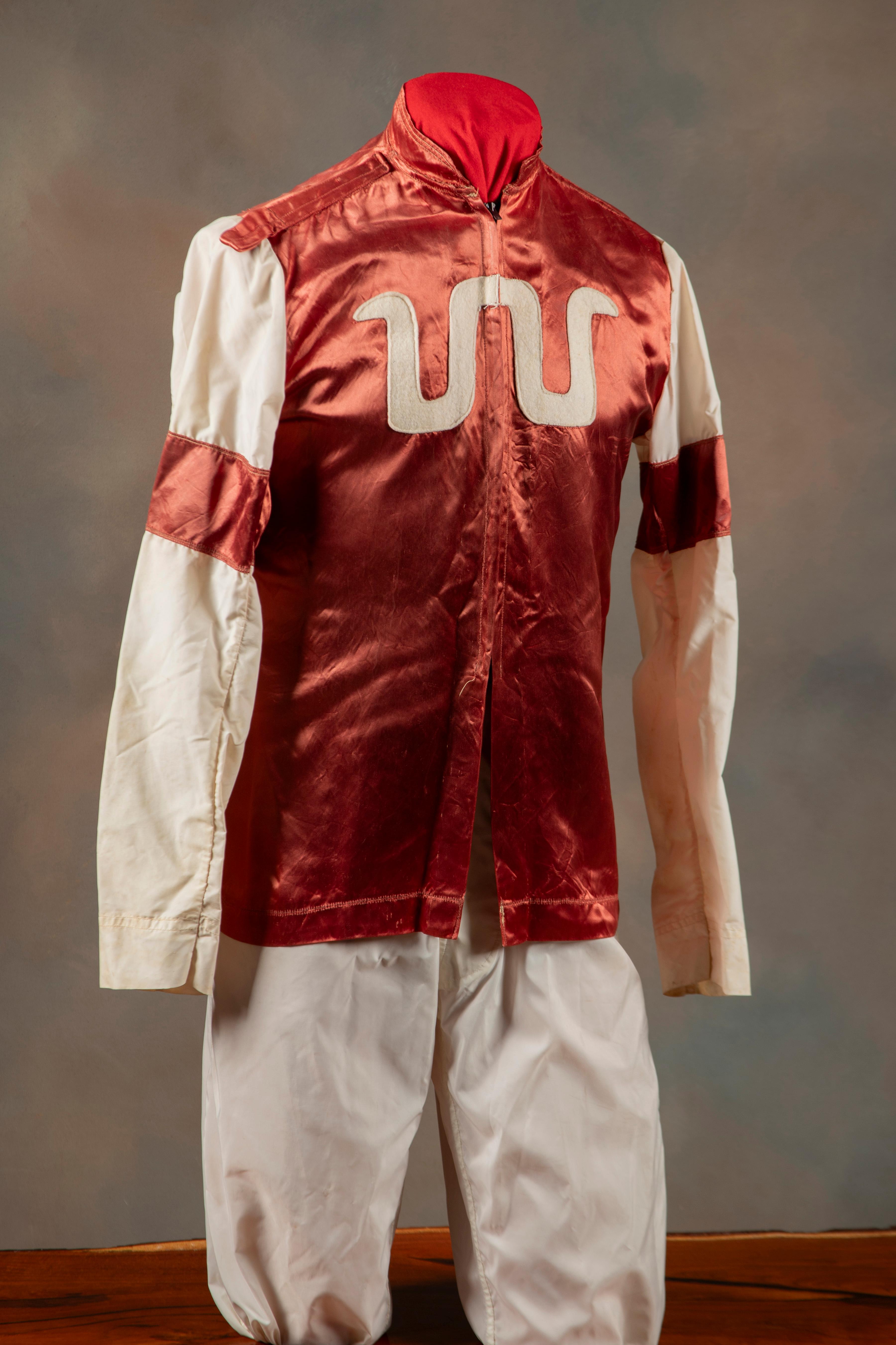 Documented Set of Racing Silks originally used on the King Ranch. These Jockey Pants and Jacket have