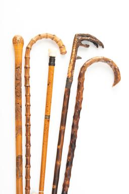 Collection of five antique Walking Sticks (2) and Canes (3). One has a Turkey Foot handle. They meas