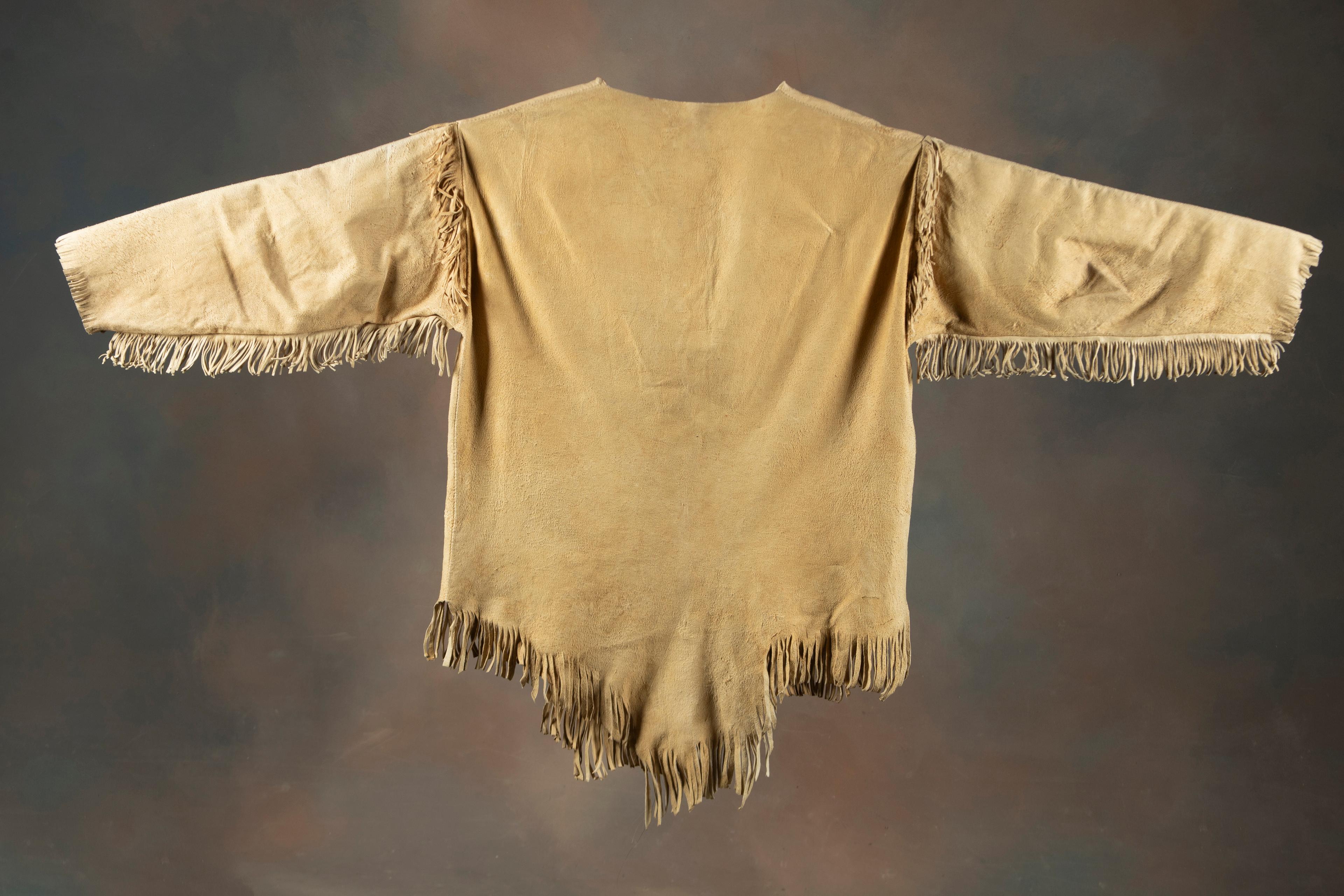 Later Doe Skin and fringed beaded Jacket with strips of beadwork on arms, some hand painting of Buff