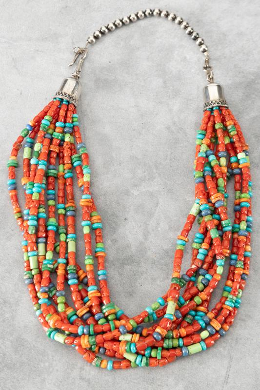 Colorful 10 string turquoise and coral beaded Necklace by noted designer Don Lucas, 23" long marked