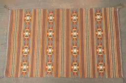 Unique Navajo Weaving with unique colors and great graphic design. Very fine condition, measures 47