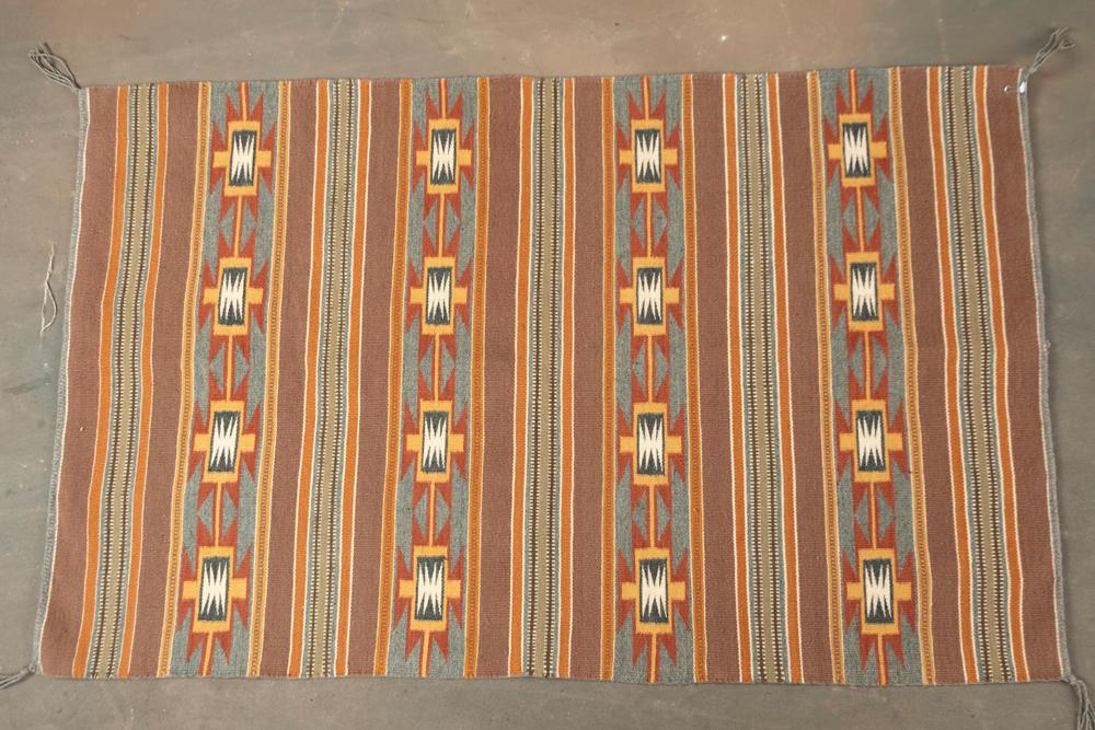Unique Navajo Weaving with unique colors and great graphic design. Very fine condition, measures 47