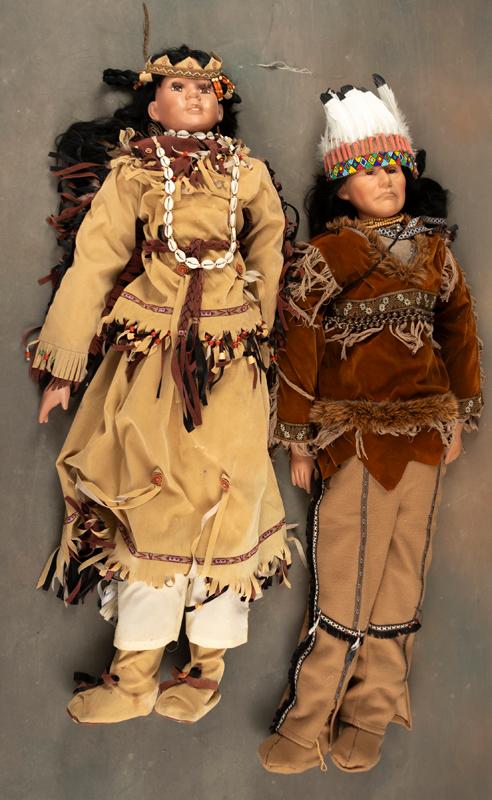 Matching pair of near life size Indian Dolls to include Chief and Indian Maiden. Dolls measure 4 ft.