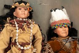Matching pair of near life size Indian Dolls to include Chief and Indian Maiden. Dolls measure 4 ft.