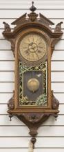 Antique walnut New Haven, American Calendar Wall Clock, circa 1886, eight day time and strike, in be