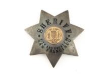 Vintage 7-point Star Badge marked â€œSHERIFF CITY AND COUNTY OF SAN FRANCISCOâ€� with gold tone cent