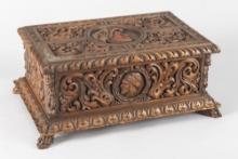 Extremely ornate walnut hand carved Jewelry Box with carved footed base, circa 1900, fully carved on