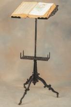 Very desirable ornate antique cast iron Dictionary Stand with folding top and a vintage Dictionary.