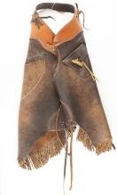 Pair of custom Bull Hide Fringed Chinks with outside sewn pockets, showing use but in very good cond