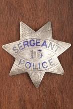 Vintage 7-point Star Badge marked â€œSERGEANT/ 15/ POLICEâ€�, two holes at the top of badge, looks l