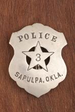 Large vintage Shield Badge with 5-point cut-out Star marked â€œPOLICE SAPULPA, OKLA.â€� with â€œ3â€�