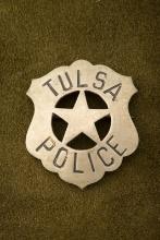 Vintage Shield Star Badge with cut-out 5-point star center marked â€œTULSA POLICEâ€�. Has no hallmar