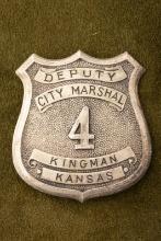 Vintage silver tone Shield Badge marked â€œDEPUTY/CITY MARSHAL/ 4 /KINGMAN/ KANSASâ€�, has lots of a