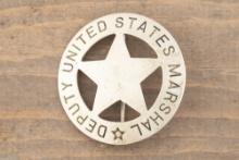 Silver colored vintage 5-point, cut-out Circle Star Badge marked â€œDEPUTY UNITED STATES MARSHALâ€�.