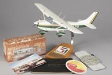 This lot consists of the following six (6) Items: (1) A Cessna Model Airplane, plaque on front marke