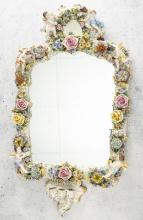 Extremely fine Capodimonte Hanging Mirror, 33" T x 18" W. This mirror is surrounded by porcelain flo