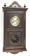 Antique German Wall Clock, eight day time and strike, in heavily carved oak case marked "Clairetta",