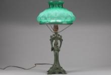 Antique Art Nouveau figural metal Table Lamp in original patina with 11" embossed cased glass shade,