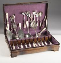 Group of 30 pieces of mismatched "Sterling" marked Flatware with mother of pearl handles, sold in a