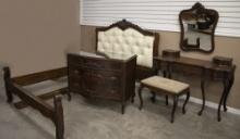 Antique four(4) piece carved Mahogany Bedroom Suit. Including a full size Bed with button tufted hea