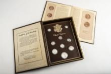 "The Kennedy Mint Portfolio of United States Coins" written by "Thomas E. Hudgeons" consisting of Fo