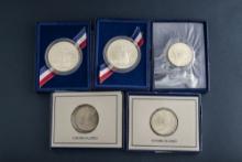 This lot has five (5) uncirculated U.S. Coins to include three (3) Uncirculated Commemorative 1986-1