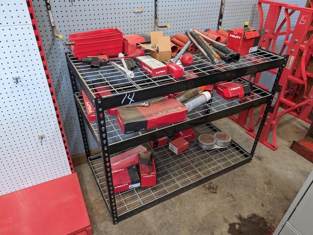 METAL RACK W/LOTS OF HILTI PARTS