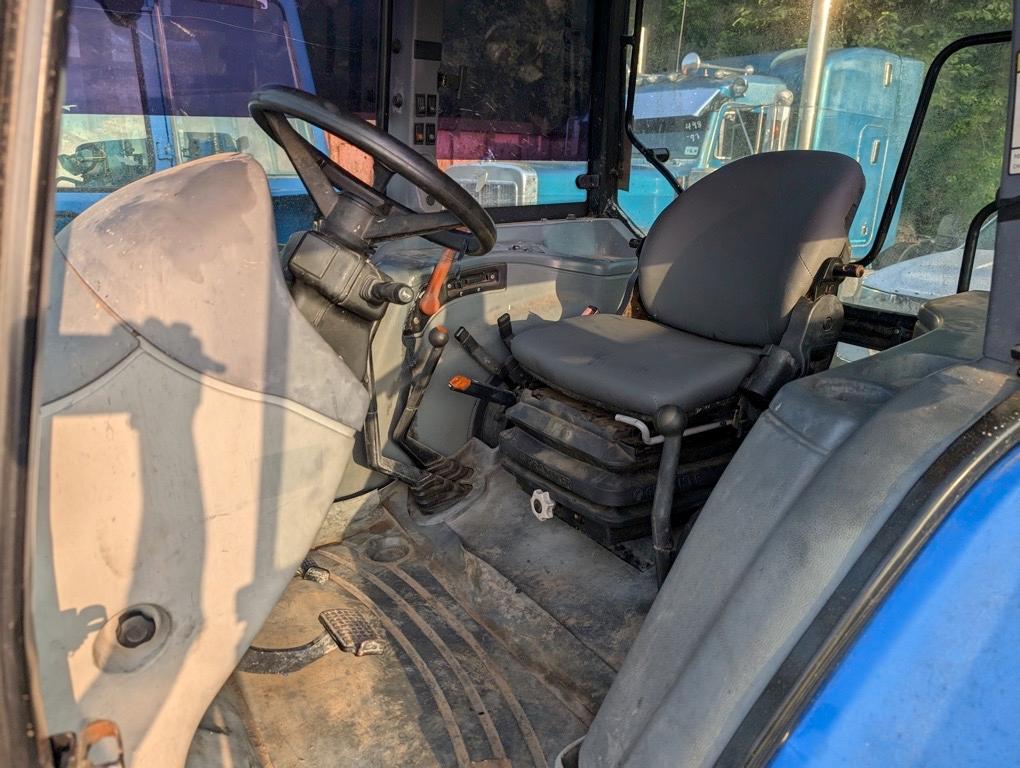 NEEW HOLLAND TL100A TRACTOR
