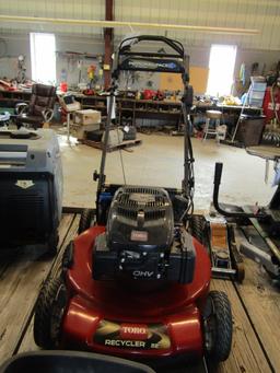 1414. 401-938. TORO 7.25 H.P. 22 INCH SELF PROPELLED MOWER WITH BAGGER & EL