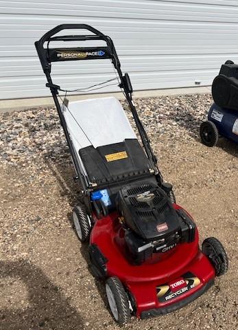 1414. 401-938. TORO 7.25 H.P. 22 INCH SELF PROPELLED MOWER WITH BAGGER & EL