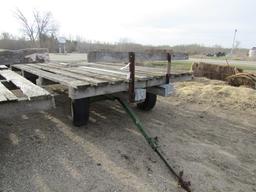 1781. 210-252 10 X 20 FT. WOOD FLAT RACK ON JD 1065A FOUR WHEEL WAGON, TAX