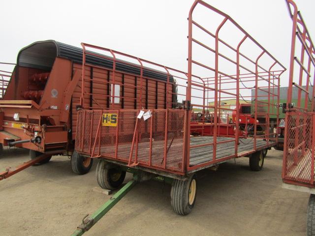 493. 386-889. H&S 9 X 18 THROW RACK ON JD 1065A FOUR WHEEL WAGON, TAX / SIG