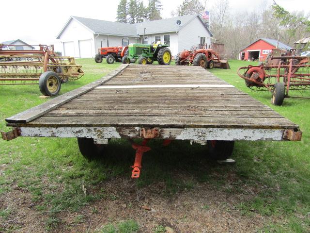 146. 4 WHEEL WAGON WITH OLDER 8 FT. X 16 FT. WOODEN FLAT RACK