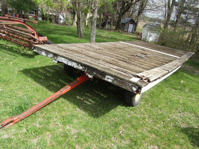 146. 4 WHEEL WAGON WITH OLDER 8 FT. X 16 FT. WOODEN FLAT RACK