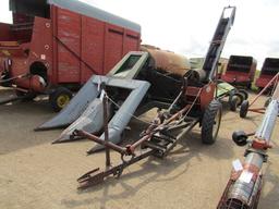 914. 327-823. NEW IDEA 325, TWO ROW 30 INCH CORN PICKER, TAX / SIGN ST3