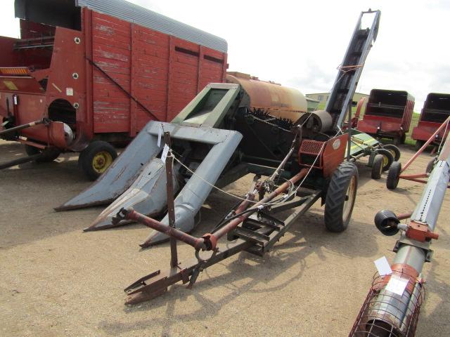 914. 327-823. NEW IDEA 325, TWO ROW 30 INCH CORN PICKER, TAX / SIGN ST3
