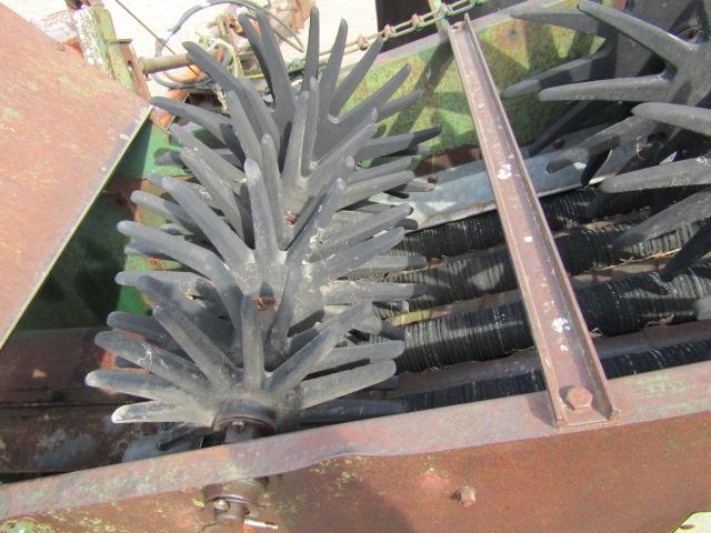 914. 327-823. NEW IDEA 325, TWO ROW 30 INCH CORN PICKER, TAX / SIGN ST3