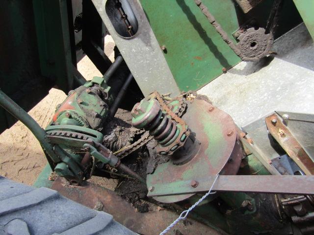 914. 327-823. NEW IDEA 325, TWO ROW 30 INCH CORN PICKER, TAX / SIGN ST3