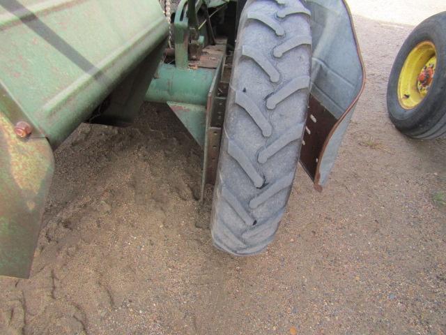 914. 327-823. NEW IDEA 325, TWO ROW 30 INCH CORN PICKER, TAX / SIGN ST3