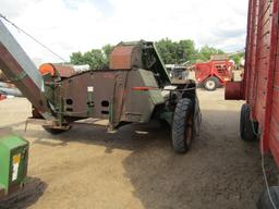 914. 327-823. NEW IDEA 325, TWO ROW 30 INCH CORN PICKER, TAX / SIGN ST3