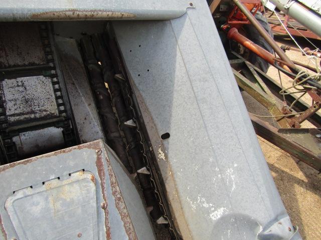 914. 327-823. NEW IDEA 325, TWO ROW 30 INCH CORN PICKER, TAX / SIGN ST3