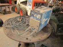 1481. MILLER MODEL CS 250 STICK WELDER WITH (2) HELMETS