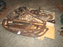 1648. PALLET OF BOW SAWS, HORSE SHOES, PLANES, WELL WHEEL, CAST IRON PAN AN