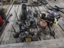 1733. LARGE ASSORTMENT OF OIL CANS