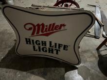 1764. 31” X 39” MILLER HIGH LIFE LIGHT SINGLE SIDED TIN SIGN