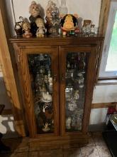 1777. 28” X 50” X 12” CURIO CABINET, DOUBLE GLASS DOORS, GLASS SHELVES, SOLD WITH CONTENTS,