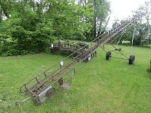 1853. 40’ BALE ELEVATOR ON TRANSPORT WITH 1 H.P. SEALED ELECTRIC MOTOR